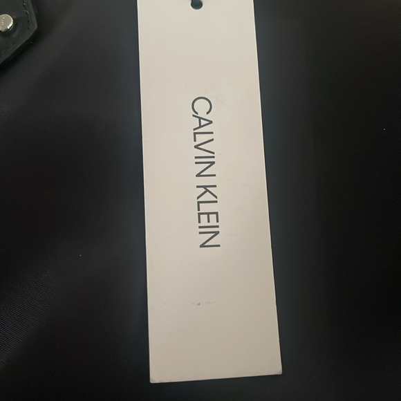 CK drawstring bucket bag. Plastic still on the hardware. And smells great. - Picture 4 of 6